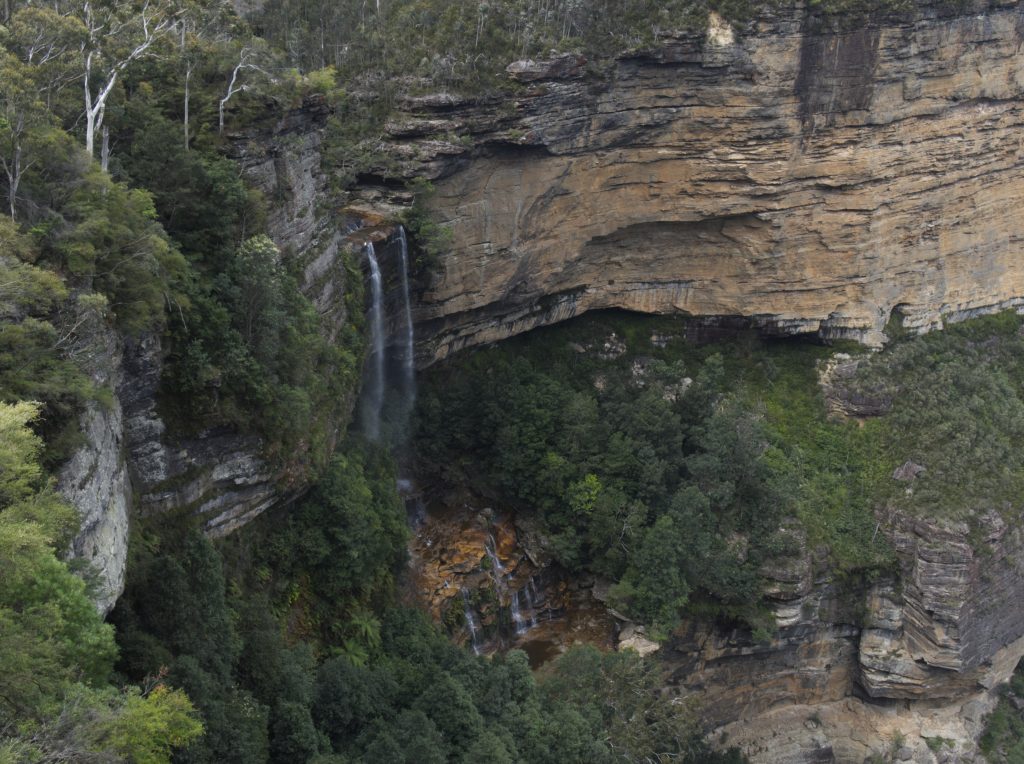 Katoomba Falls spilling into the Jamison Valley as seen from Katoomba Falls Reserve