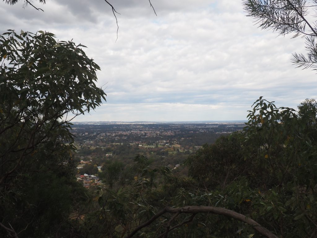 Looking east towards Sydney with Penrith on the plain below, from Elizabeth Lookout in Knapsack Reserve in Glenbrook