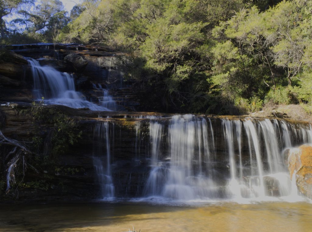 Upper Wentworth Falls has two main layers, forming a small pool at the bas before continuing on to flow over the main falls 